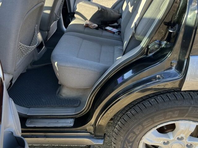 Черный Киа Соренто, объемом двигателя 2.4 л и пробегом 205 тыс. км за 6650 $, фото 13 на Automoto.ua