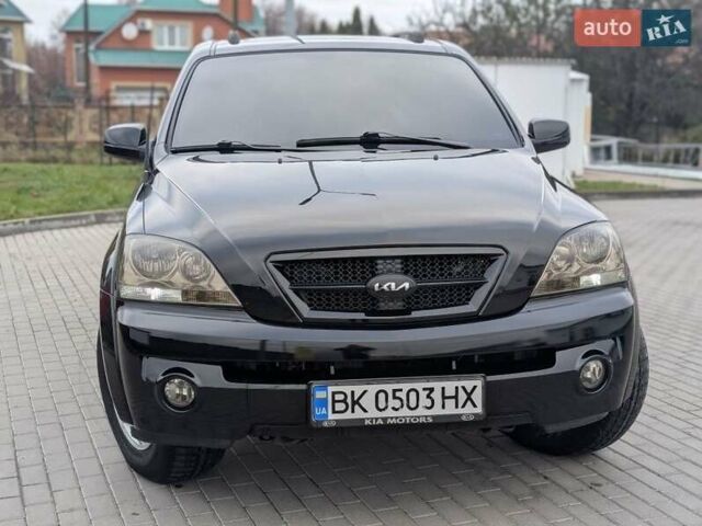 Черный Киа Соренто, объемом двигателя 2.5 л и пробегом 300 тыс. км за 8000 $, фото 2 на Automoto.ua