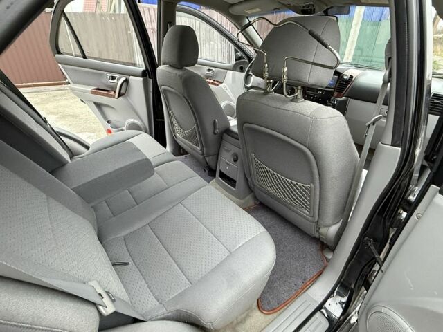 Черный Киа Соренто, объемом двигателя 2.5 л и пробегом 258 тыс. км за 5250 $, фото 17 на Automoto.ua