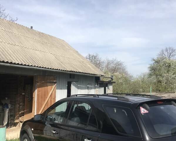 Черный Киа Соренто, объемом двигателя 2.5 л и пробегом 262 тыс. км за 9200 $, фото 43 на Automoto.ua