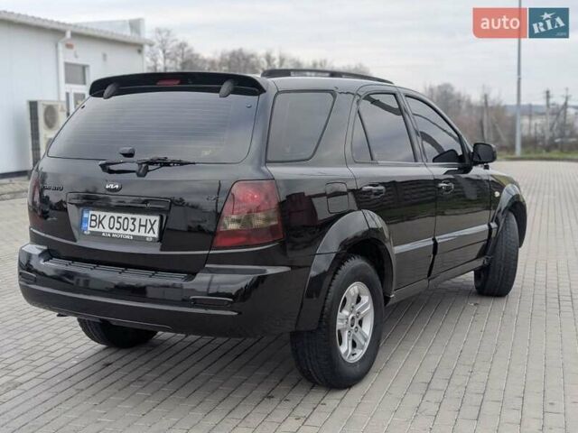Черный Киа Соренто, объемом двигателя 2.5 л и пробегом 300 тыс. км за 8000 $, фото 3 на Automoto.ua
