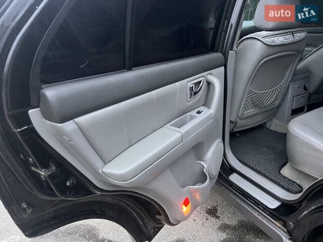 Черный Киа Соренто, объемом двигателя 2.5 л и пробегом 340 тыс. км за 7500 $, фото 11 на Automoto.ua