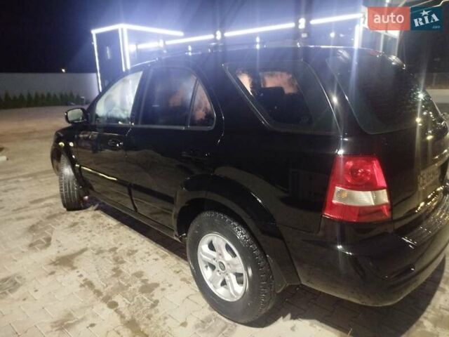 Черный Киа Соренто, объемом двигателя 2.5 л и пробегом 256 тыс. км за 7250 $, фото 4 на Automoto.ua