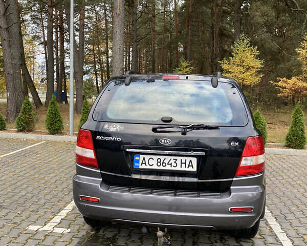Черный Киа Соренто, объемом двигателя 2.4 л и пробегом 260 тыс. км за 5899 $, фото 1 на Automoto.ua
