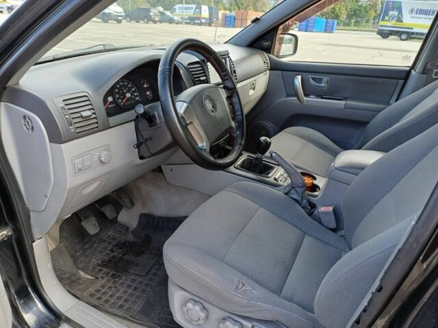 Черный Киа Соренто, объемом двигателя 2.5 л и пробегом 327 тыс. км за 3400 $, фото 3 на Automoto.ua