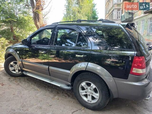 Чорний Кіа Соренто, об'ємом двигуна 2.4 л та пробігом 230 тис. км за 6800 $, фото 1 на Automoto.ua