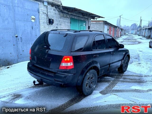 Черный Киа Соренто, объемом двигателя 25 л и пробегом 300 тыс. км за 4850 $, фото 2 на Automoto.ua