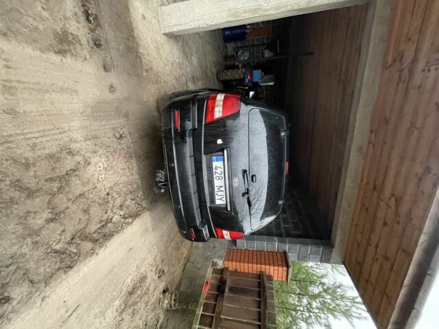 Черный Киа Соренто, объемом двигателя 2.5 л и пробегом 250 тыс. км за 4100 $, фото 1 на Automoto.ua