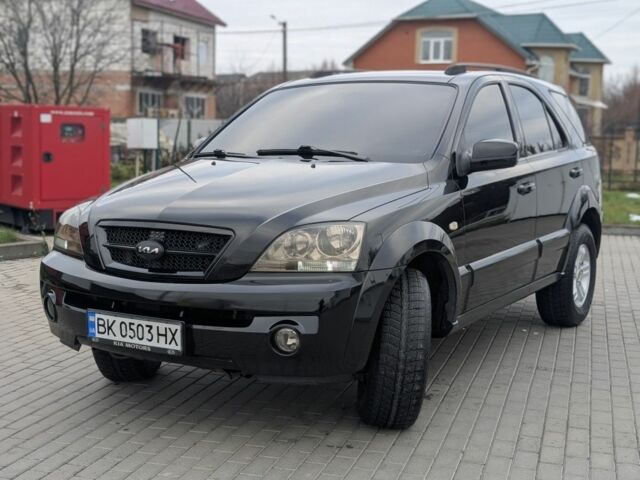 Черный Киа Соренто, объемом двигателя 2.5 л и пробегом 300 тыс. км за 8000 $, фото 2 на Automoto.ua