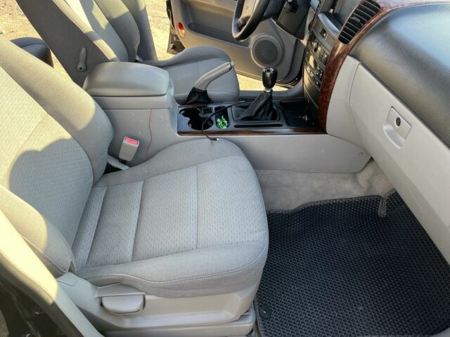 Черный Киа Соренто, объемом двигателя 2.4 л и пробегом 205 тыс. км за 6650 $, фото 3 на Automoto.ua