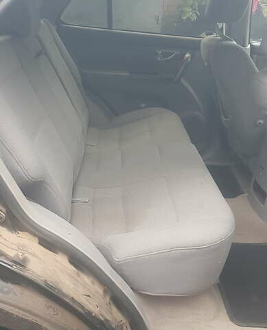 Черный Киа Соренто, объемом двигателя 2.35 л и пробегом 127 тыс. км за 6400 $, фото 4 на Automoto.ua