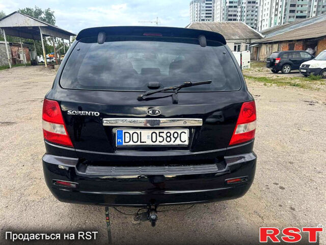 Черный Киа Соренто, объемом двигателя 2.5 л и пробегом 218 тыс. км за 3800 $, фото 5 на Automoto.ua