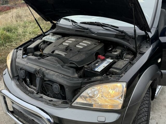 Черный Киа Соренто, объемом двигателя 2.5 л и пробегом 258 тыс. км за 5250 $, фото 13 на Automoto.ua