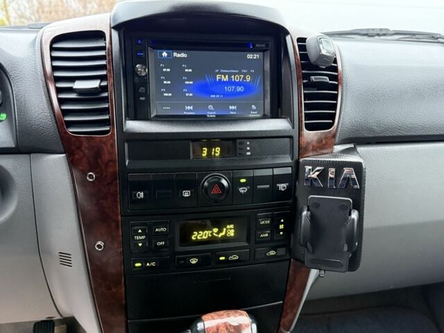 Черный Киа Соренто, объемом двигателя 2.5 л и пробегом 258 тыс. км за 5250 $, фото 23 на Automoto.ua