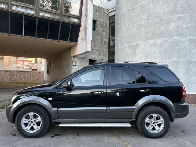 Черный Киа Соренто, объемом двигателя 2.5 л и пробегом 279 тыс. км за 4600 $, фото 4 на Automoto.ua