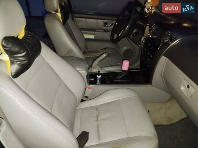 Черный Киа Соренто, объемом двигателя 2.5 л и пробегом 256 тыс. км за 7250 $, фото 10 на Automoto.ua