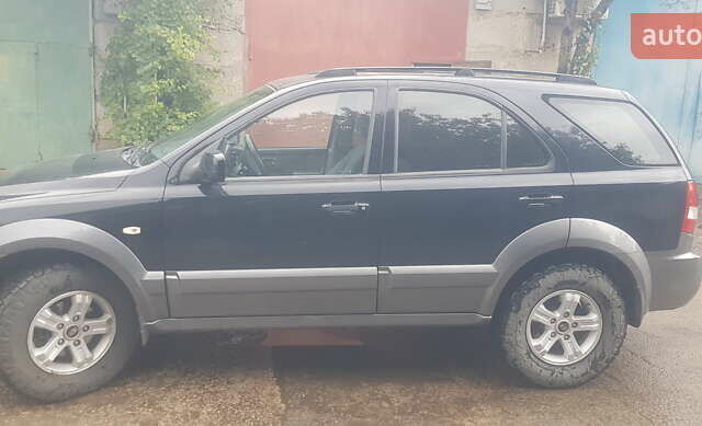 Черный Киа Соренто, объемом двигателя 2.35 л и пробегом 127 тыс. км за 6400 $, фото 11 на Automoto.ua