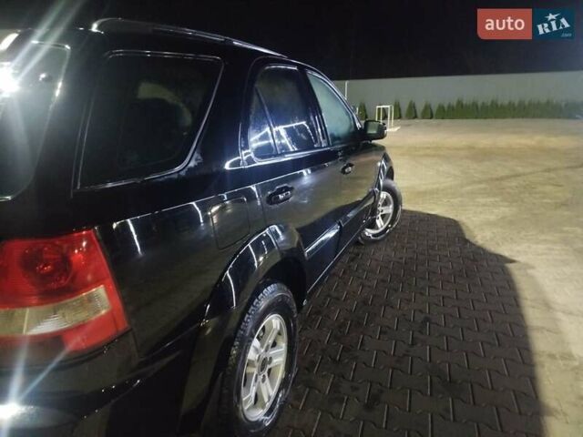 Черный Киа Соренто, объемом двигателя 2.5 л и пробегом 256 тыс. км за 7250 $, фото 3 на Automoto.ua