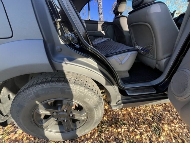 Черный Киа Соренто, объемом двигателя 2.5 л и пробегом 236 тыс. км за 8000 $, фото 6 на Automoto.ua