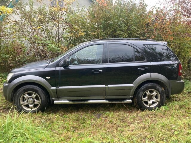 Черный Киа Соренто, объемом двигателя 2.5 л и пробегом 267 тыс. км за 3500 $, фото 6 на Automoto.ua