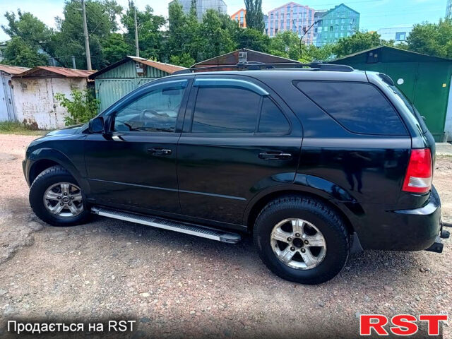 Черный Киа Соренто, объемом двигателя 3.5 л и пробегом 233 тыс. км за 6200 $, фото 2 на Automoto.ua