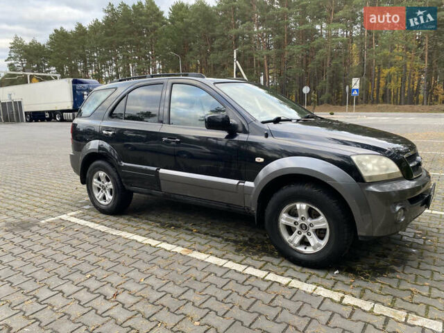 Черный Киа Соренто, объемом двигателя 2.4 л и пробегом 260 тыс. км за 5899 $, фото 3 на Automoto.ua