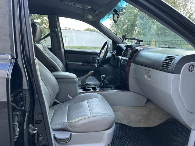 Черный Киа Соренто, объемом двигателя 2.5 л и пробегом 279 тыс. км за 4600 $, фото 13 на Automoto.ua