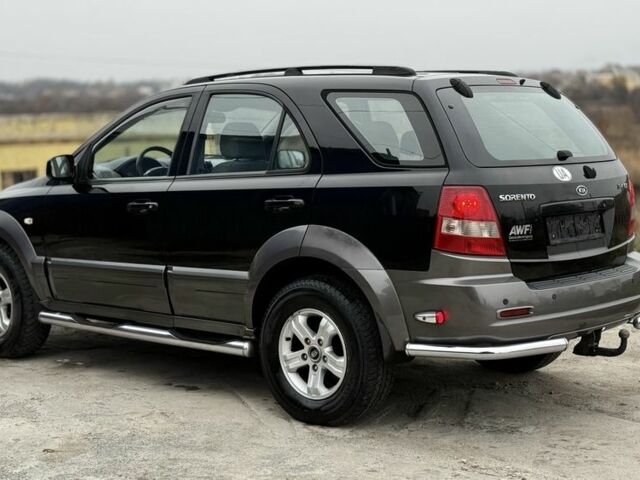 Черный Киа Соренто, объемом двигателя 2.5 л и пробегом 258 тыс. км за 5250 $, фото 3 на Automoto.ua