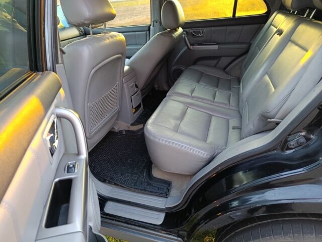 Черный Киа Соренто, объемом двигателя 2.5 л и пробегом 291 тыс. км за 7200 $, фото 4 на Automoto.ua