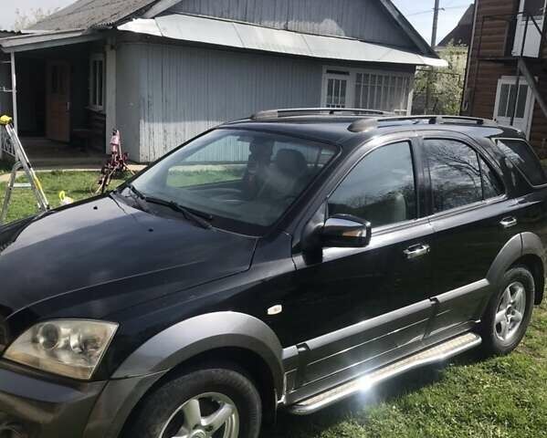 Черный Киа Соренто, объемом двигателя 2.5 л и пробегом 262 тыс. км за 9200 $, фото 45 на Automoto.ua