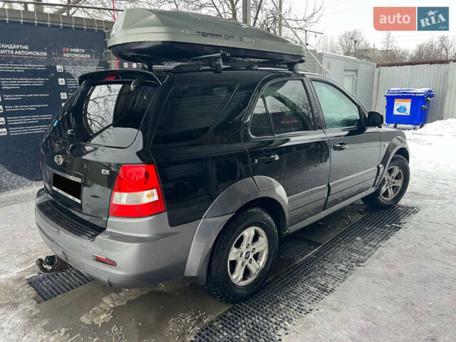 Черный Киа Соренто, объемом двигателя 2.5 л и пробегом 380 тыс. км за 6000 $, фото 6 на Automoto.ua