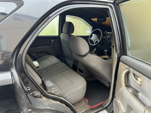 Черный Киа Соренто, объемом двигателя 2.5 л и пробегом 2 тыс. км за 800 $, фото 8 на Automoto.ua