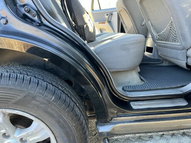 Черный Киа Соренто, объемом двигателя 2.4 л и пробегом 205 тыс. км за 6650 $, фото 5 на Automoto.ua