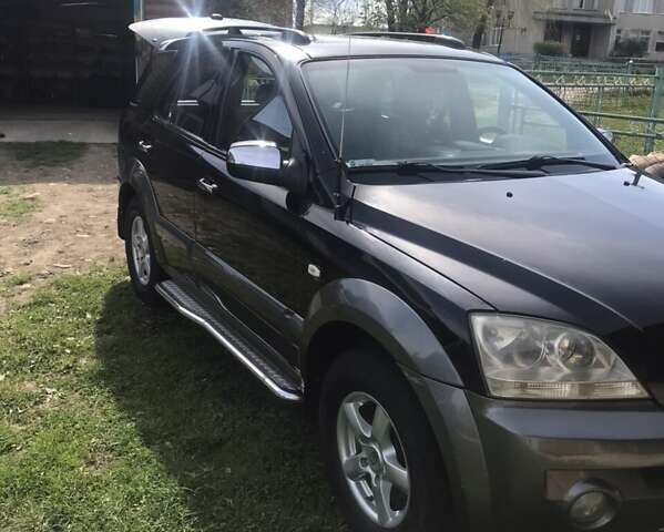Черный Киа Соренто, объемом двигателя 2.5 л и пробегом 262 тыс. км за 9200 $, фото 36 на Automoto.ua