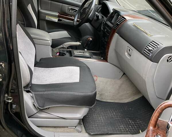 Черный Киа Соренто, объемом двигателя 2.5 л и пробегом 220 тыс. км за 4500 $, фото 2 на Automoto.ua