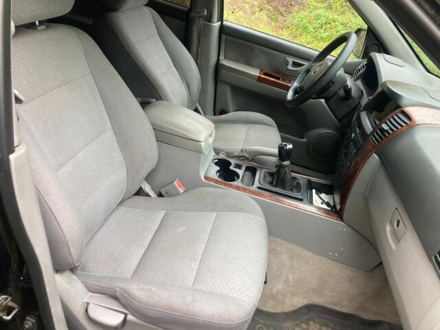 Черный Киа Соренто, объемом двигателя 2.5 л и пробегом 267 тыс. км за 3500 $, фото 7 на Automoto.ua