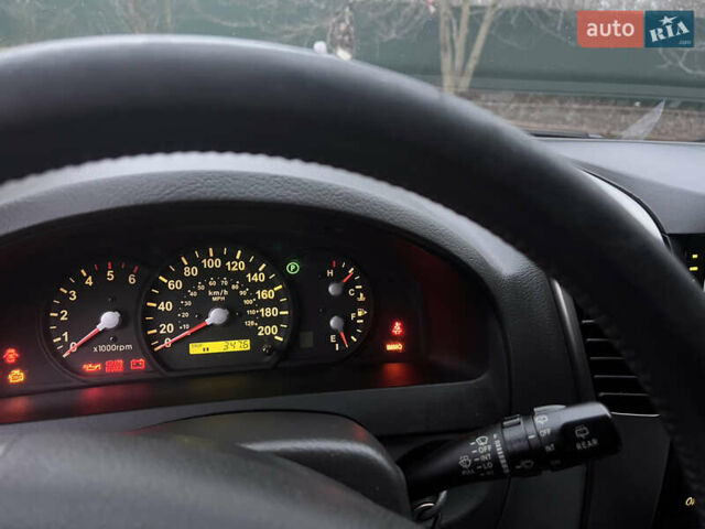 Черный Киа Соренто, объемом двигателя 2.5 л и пробегом 340 тыс. км за 7500 $, фото 6 на Automoto.ua