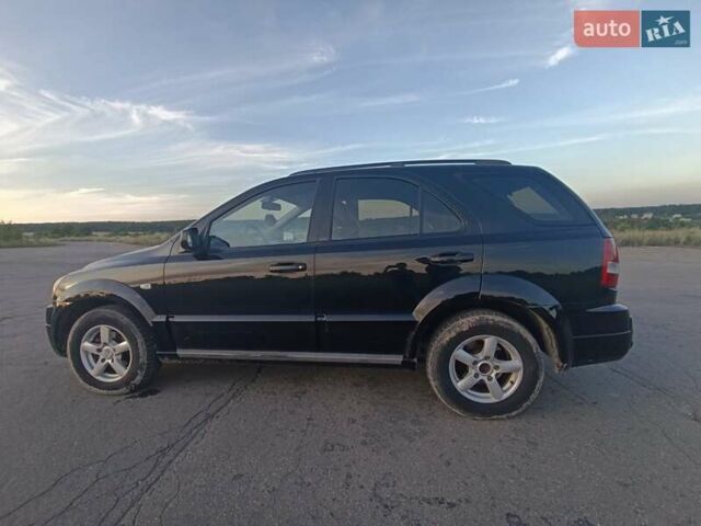 Черный Киа Соренто, объемом двигателя 2.5 л и пробегом 214 тыс. км за 8100 $, фото 10 на Automoto.ua