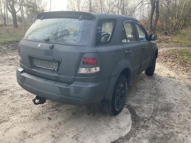 Черный Киа Соренто, объемом двигателя 2.5 л и пробегом 293 тыс. км за 3450 $, фото 5 на Automoto.ua