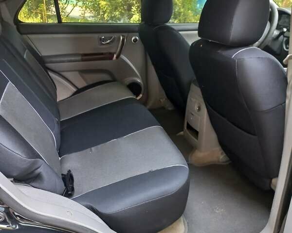 Чорний Кіа Соренто, об'ємом двигуна 2.4 л та пробігом 230 тис. км за 6800 $, фото 6 на Automoto.ua
