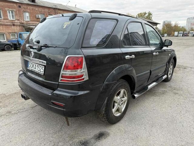 Черный Киа Соренто, объемом двигателя 2.5 л и пробегом 254 тыс. км за 3700 $, фото 5 на Automoto.ua