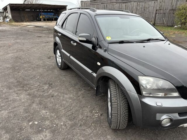 Черный Киа Соренто, объемом двигателя 2.5 л и пробегом 250 тыс. км за 7000 $, фото 1 на Automoto.ua