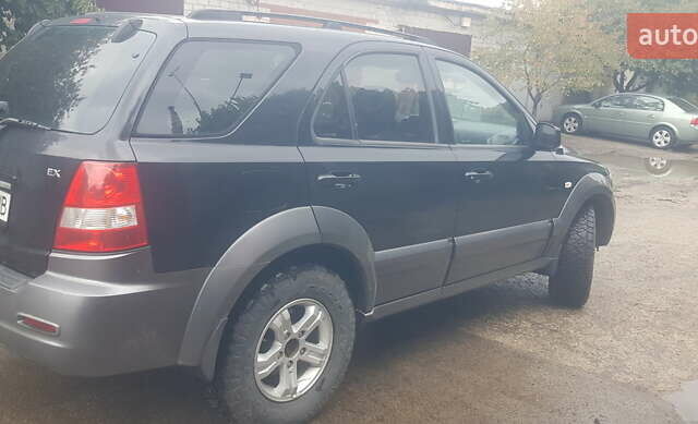 Черный Киа Соренто, объемом двигателя 2.35 л и пробегом 127 тыс. км за 6400 $, фото 8 на Automoto.ua