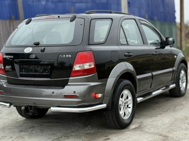 Черный Киа Соренто, объемом двигателя 2.5 л и пробегом 258 тыс. км за 5250 $, фото 6 на Automoto.ua