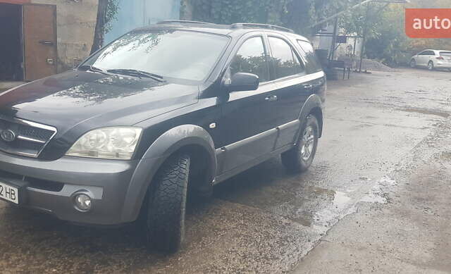 Черный Киа Соренто, объемом двигателя 2.35 л и пробегом 127 тыс. км за 6400 $, фото 13 на Automoto.ua