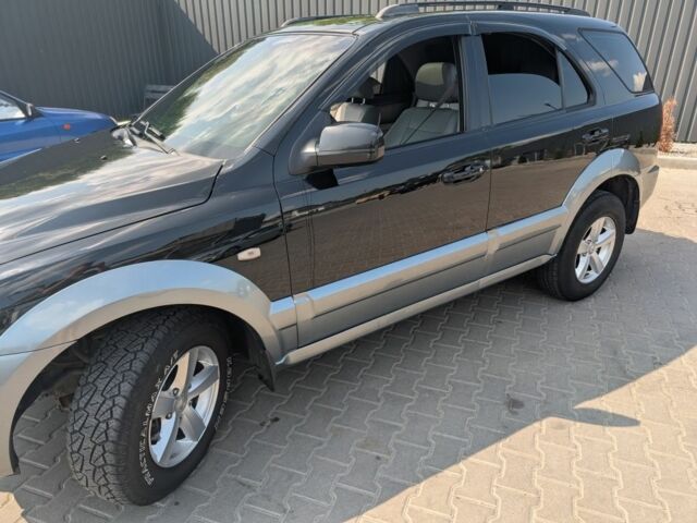 Чорний Кіа Соренто, об'ємом двигуна 2.5 л та пробігом 357 тис. км за 7600 $, фото 1 на Automoto.ua