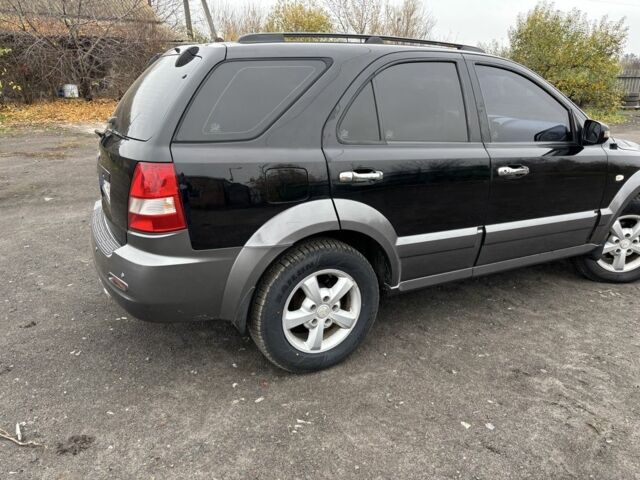 Черный Киа Соренто, объемом двигателя 2.5 л и пробегом 250 тыс. км за 7000 $, фото 4 на Automoto.ua