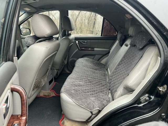 Черный Киа Соренто, объемом двигателя 2.5 л и пробегом 237 тыс. км за 3450 $, фото 8 на Automoto.ua