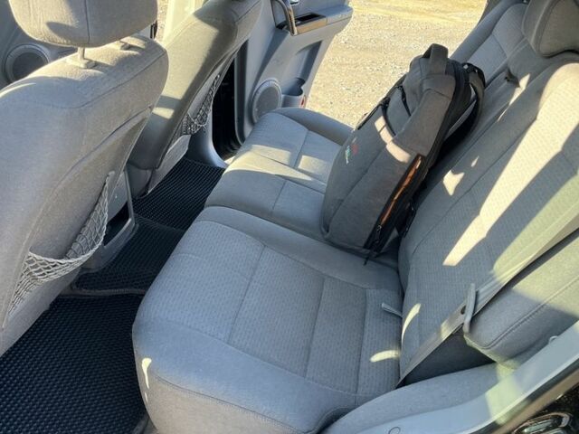 Черный Киа Соренто, объемом двигателя 2.4 л и пробегом 205 тыс. км за 6650 $, фото 12 на Automoto.ua