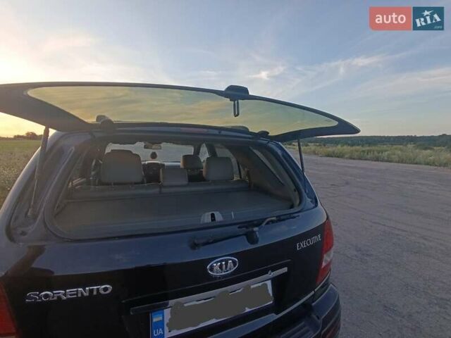 Черный Киа Соренто, объемом двигателя 2.5 л и пробегом 214 тыс. км за 8100 $, фото 4 на Automoto.ua